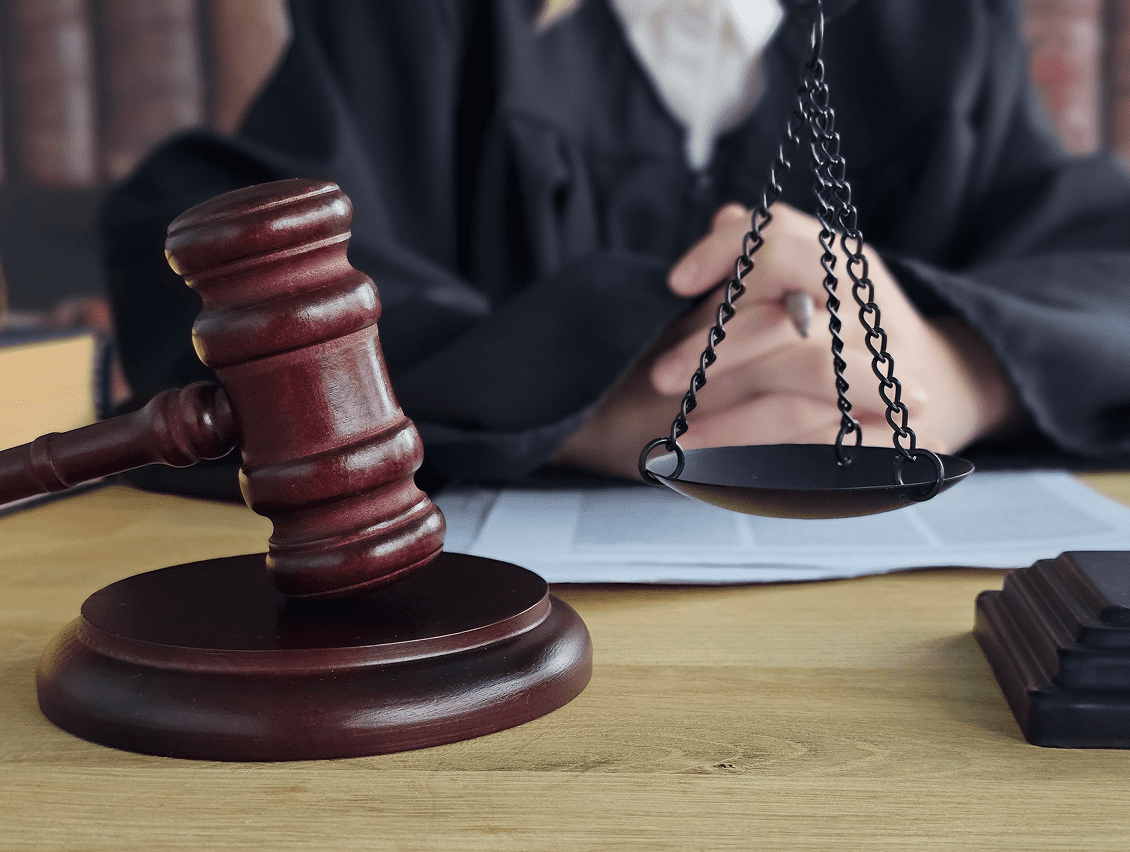 Judge's gavel and scales of justice.