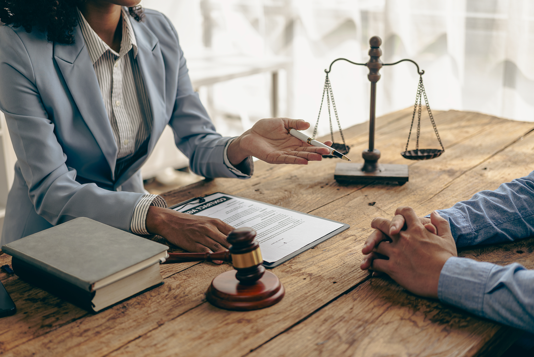 Legal consultation with documents and scales